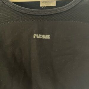 Black crop top sports wear.